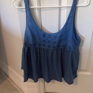 Adorable women’s summer sleeveless top with cute design.